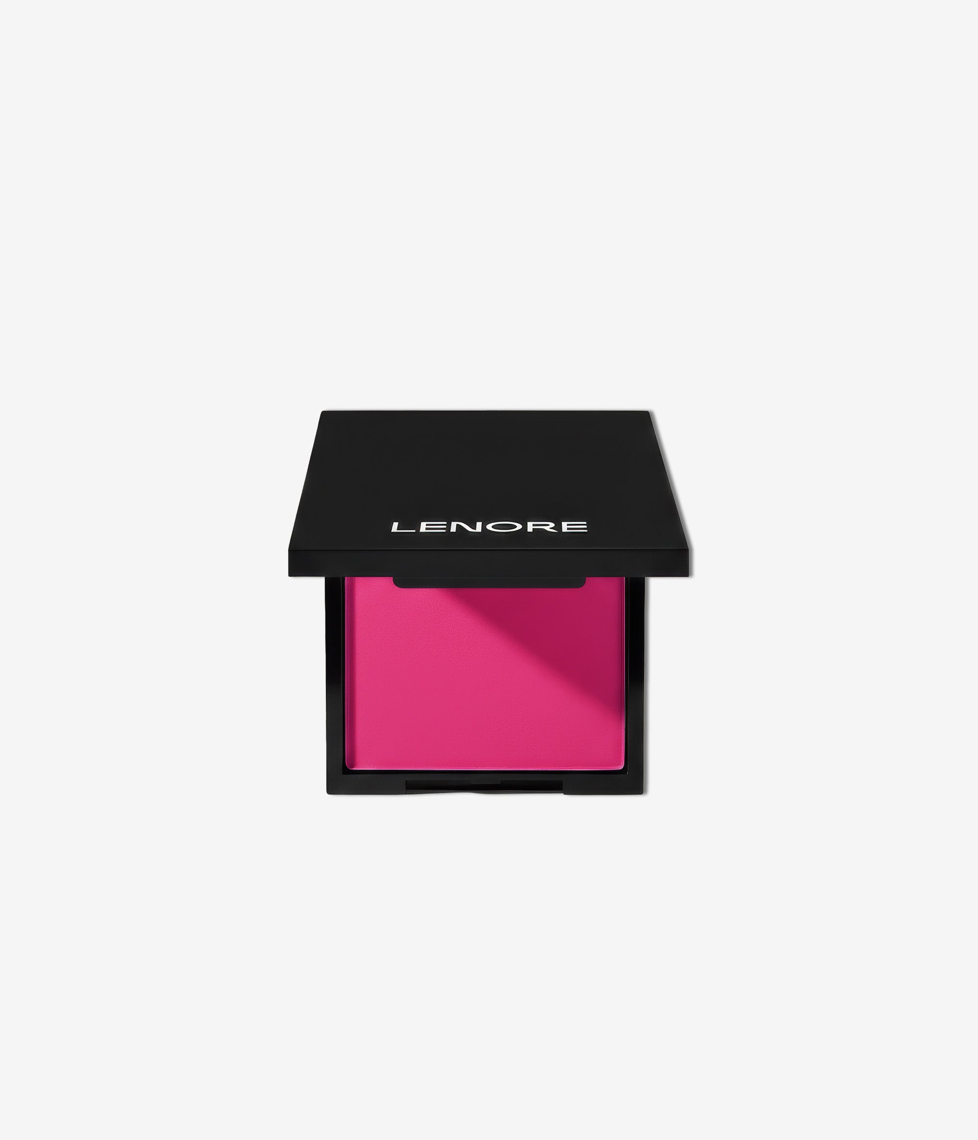 Pink makeup compact with black lid on a white background