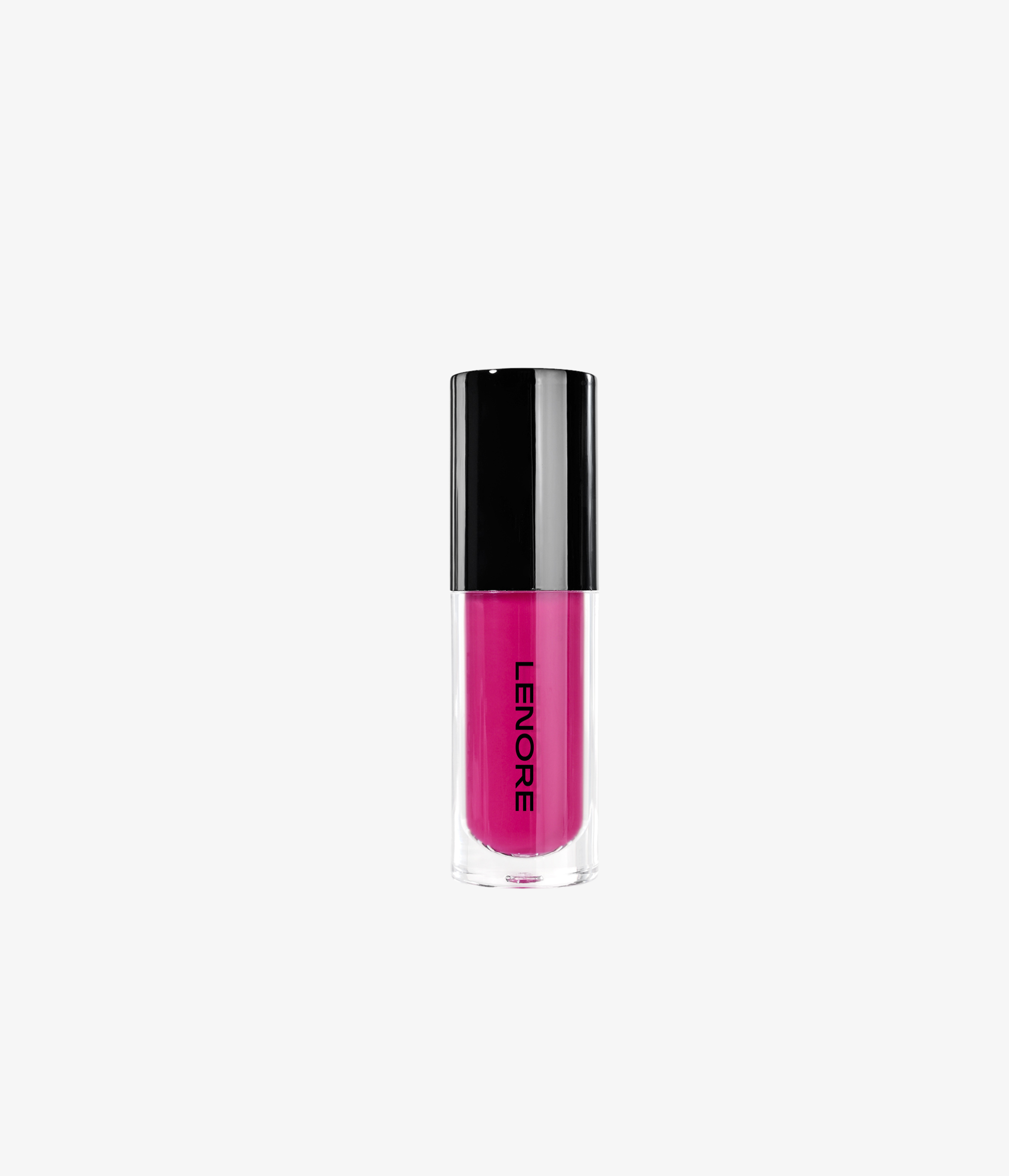 Dark pink liquid blush with applicator on a grey background