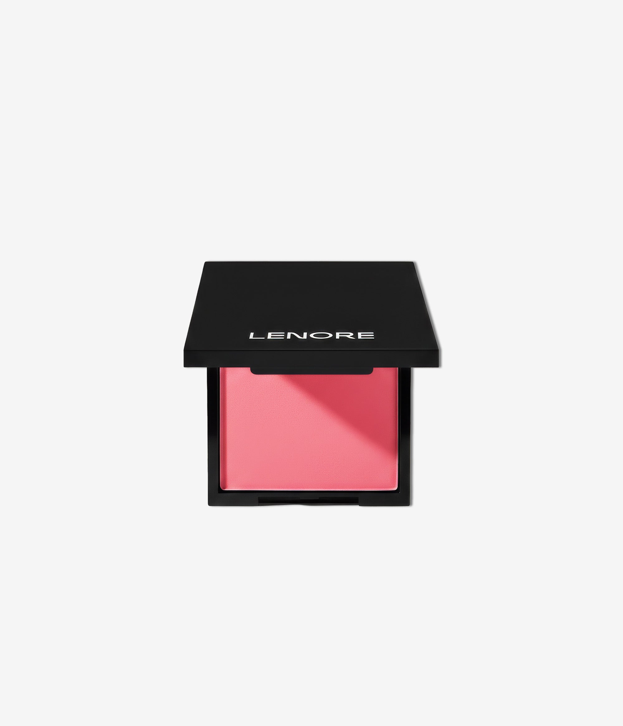 Pink blush in a black compact with 'Lenore' branding on a light beige background