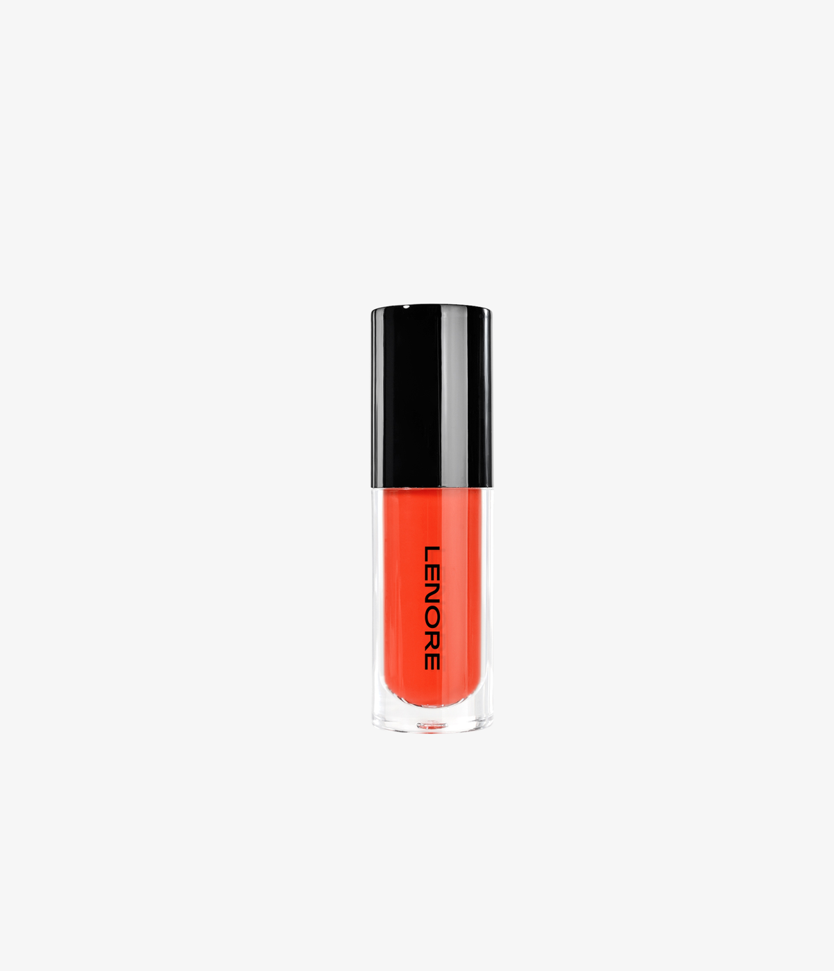 Coral liquid blush with applicator on a light beige background